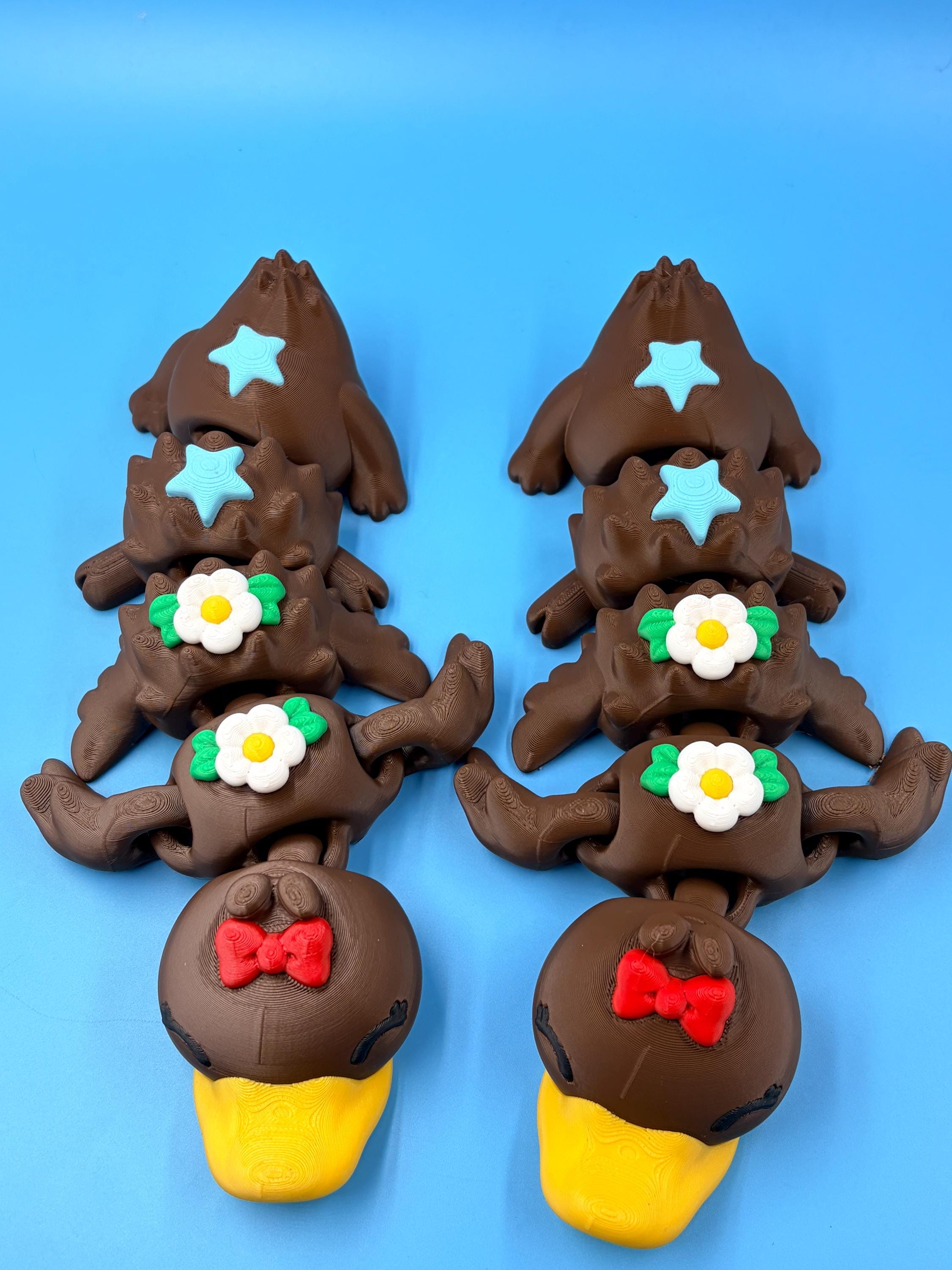 Articulated Duck Figurine with Flowers, Stars | Poseable Fidget Toy